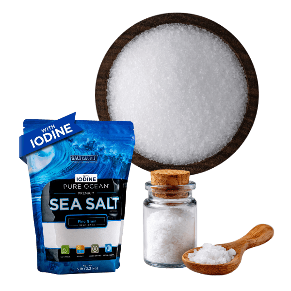 Refined iodized sea salt crystals in bowl for bulk food export supply
